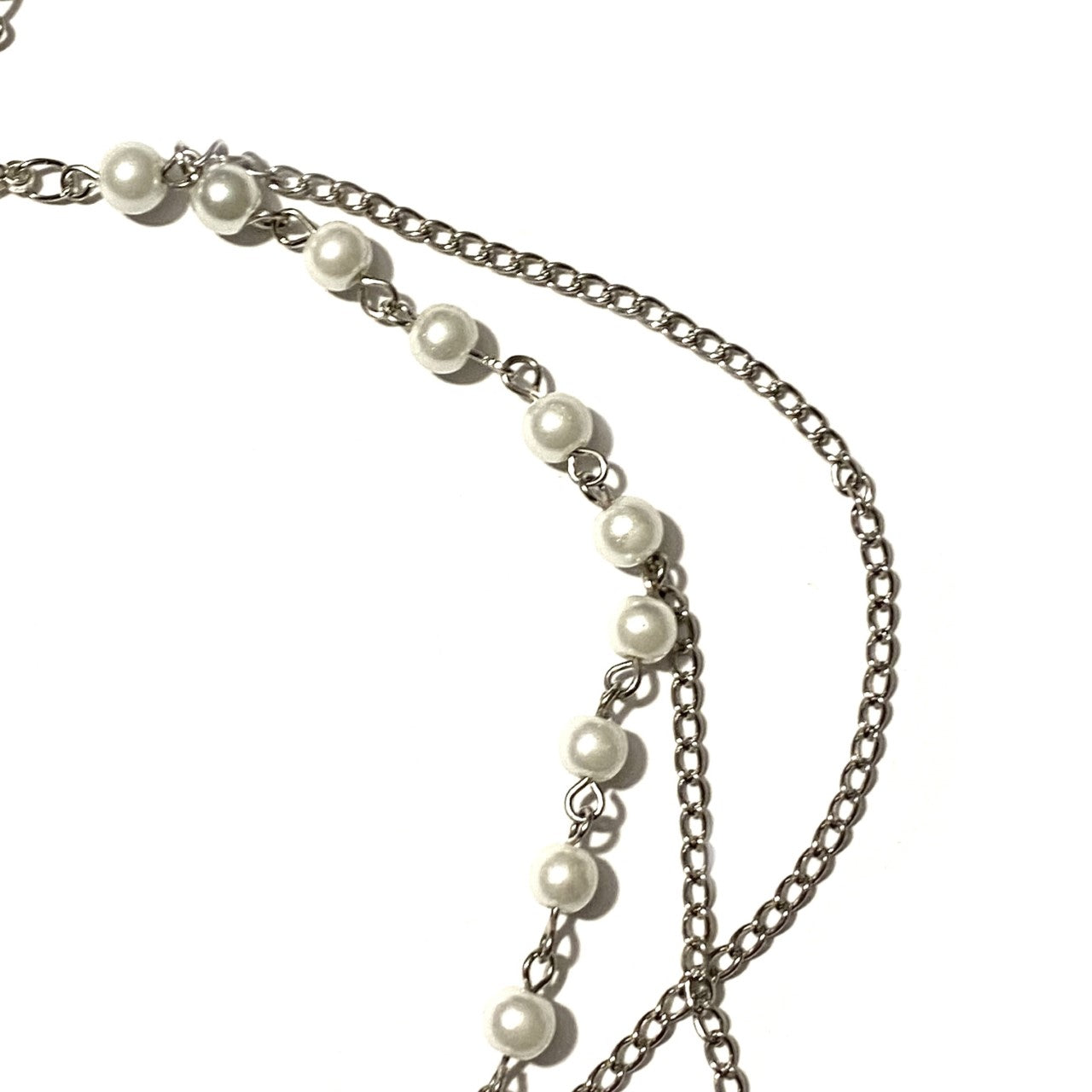 Necklace with White Pearls and a Silver Cross