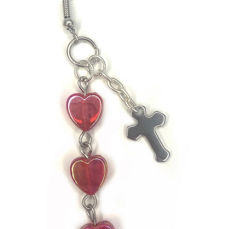 Earrings with red hearts and a chrome cross charm