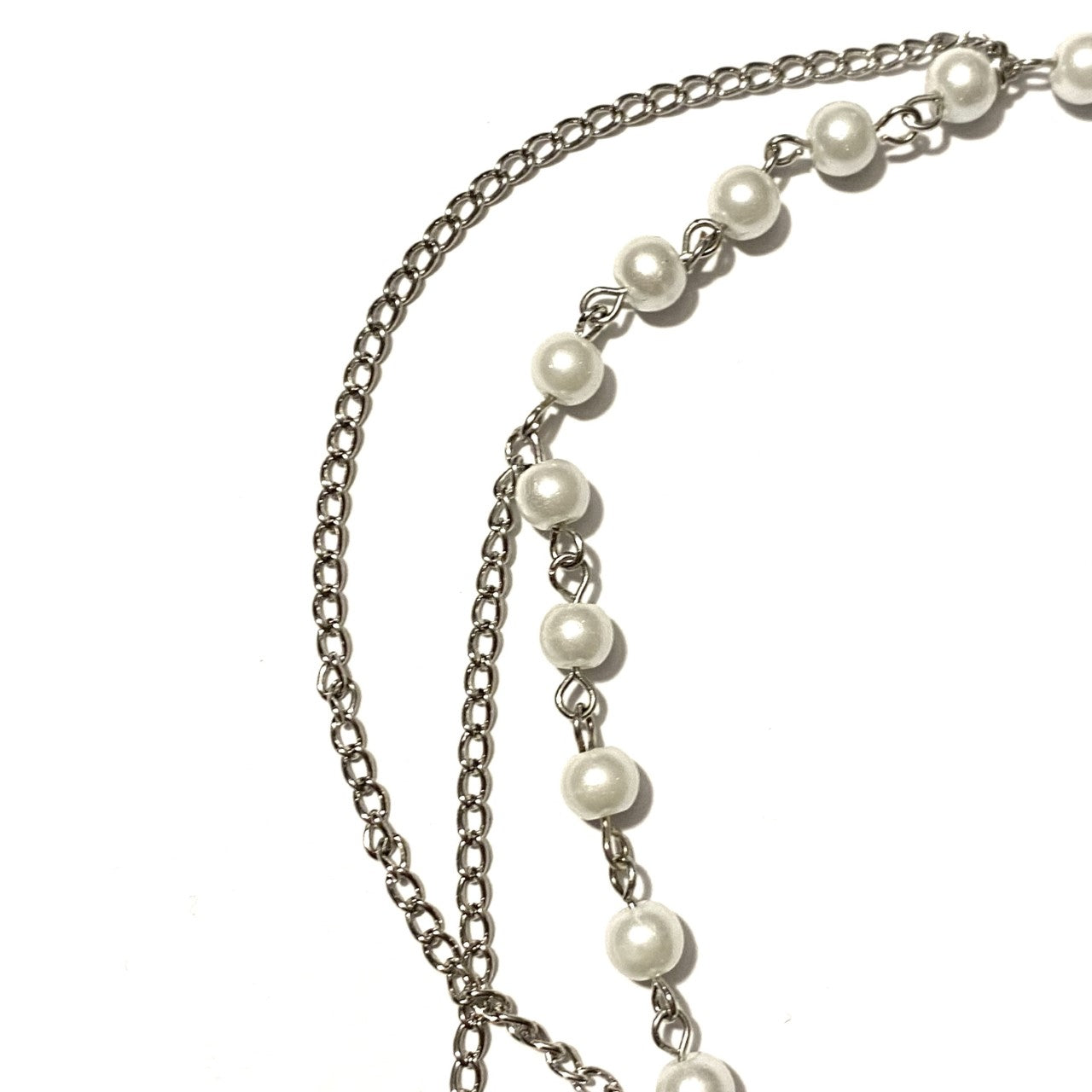 Necklace with White Pearls and a Silver Cross